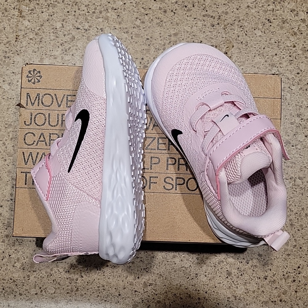 Nike revolution pink foam toddler shoes